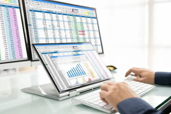 depositphotos_542122088-stock-photo-analyst-working-spreadsheet-business-data